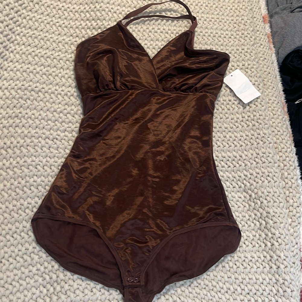 Skims sheer body suit.